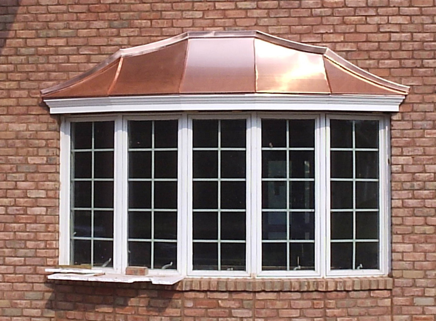 Another 5 panel bow window with a copper roof