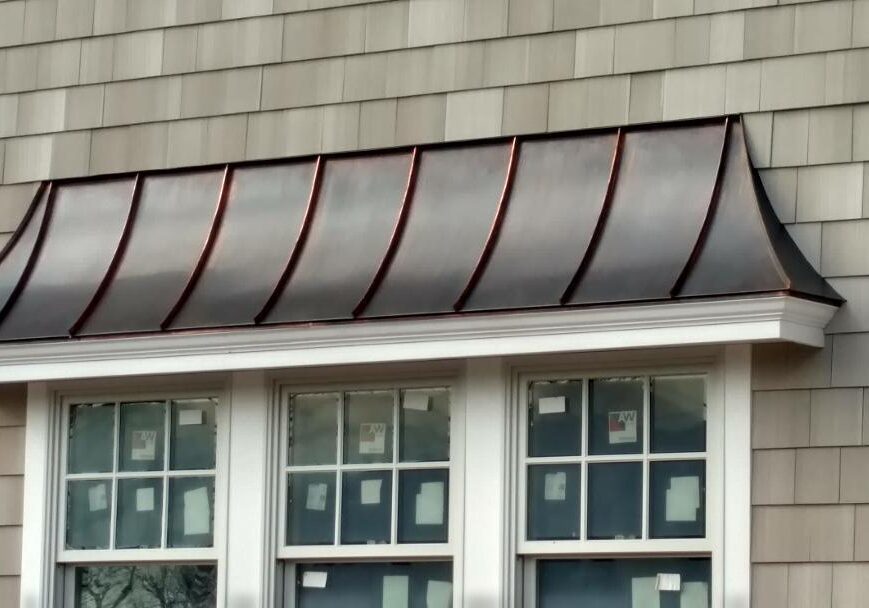 Door canopy with brown patina